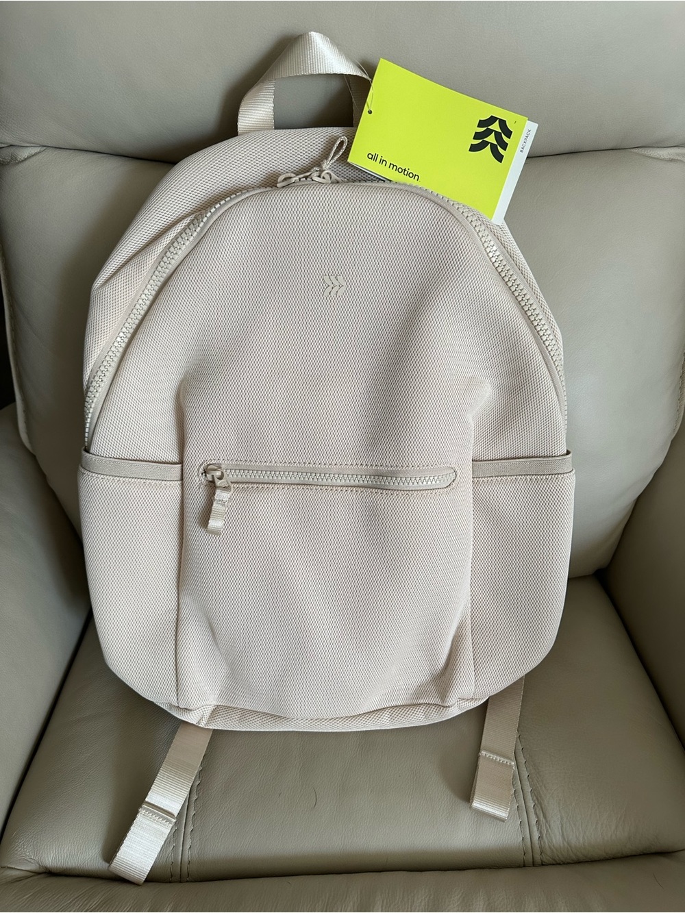 all in motion Cream Backpack with Front Zip Pocket
